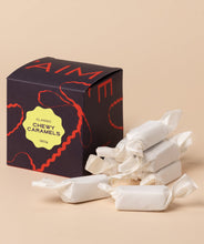 Box of J'AIME classic chewy caramels with individually wrapped caramels in front