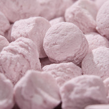 Close-up of pink candy pastilles